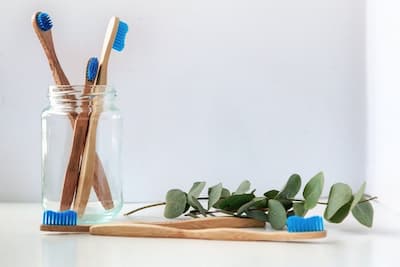 Toothbrushes in a jar